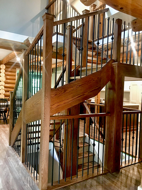 StairwayJuly2019-2-500 Example of a wood and metal custom installation requiring curved area.
